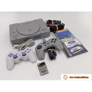 Sony PlayStation With 2 Controllers and 2 Games (Snow Boarding Ford Racing)